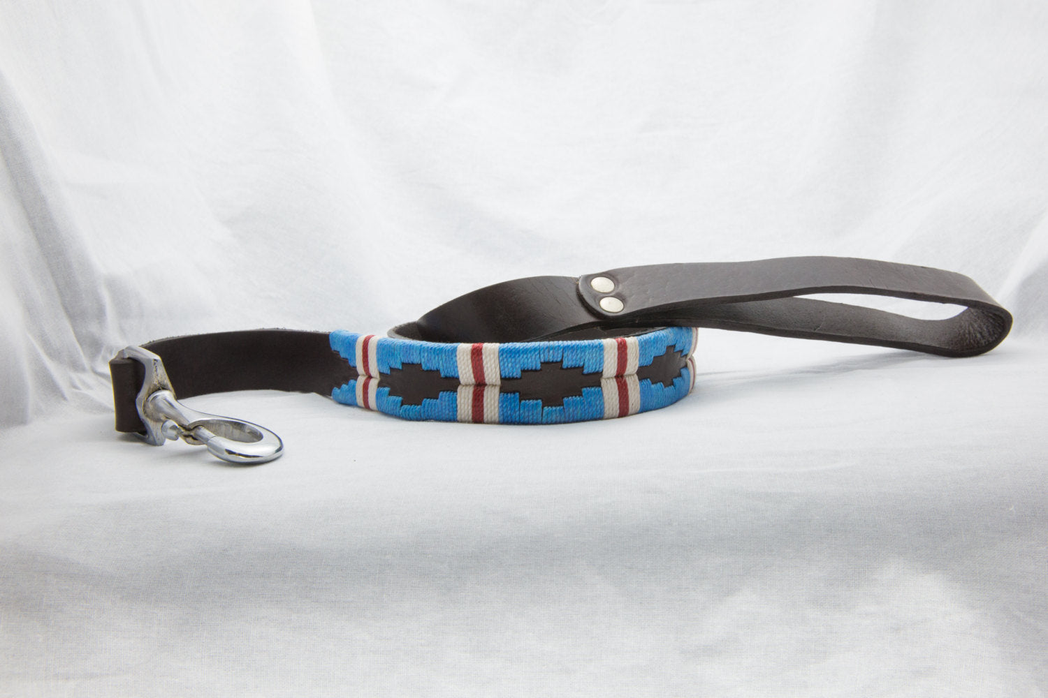 The Pacific Leather Dog Leash - hand-stitched with vibrantly colored wax threads in light blue with a white and red stripe